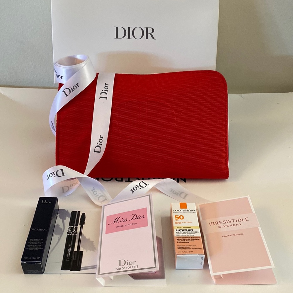 NEW DIOR ZIP POUCH 8”by 5” with 55 “ ribbon in box and samples